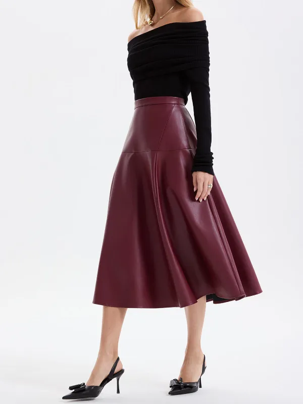 Wave Hem Faux Leather Midi Skirt sold by COMMENSE