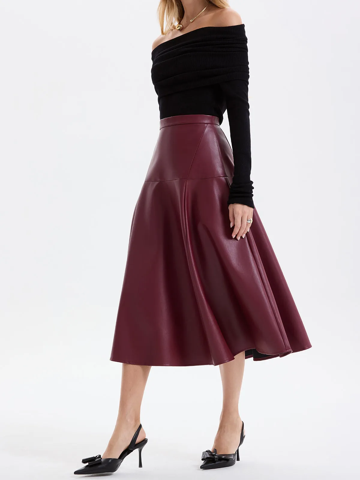 Wave Hem Faux Leather Midi Skirt sold by COMMENSE