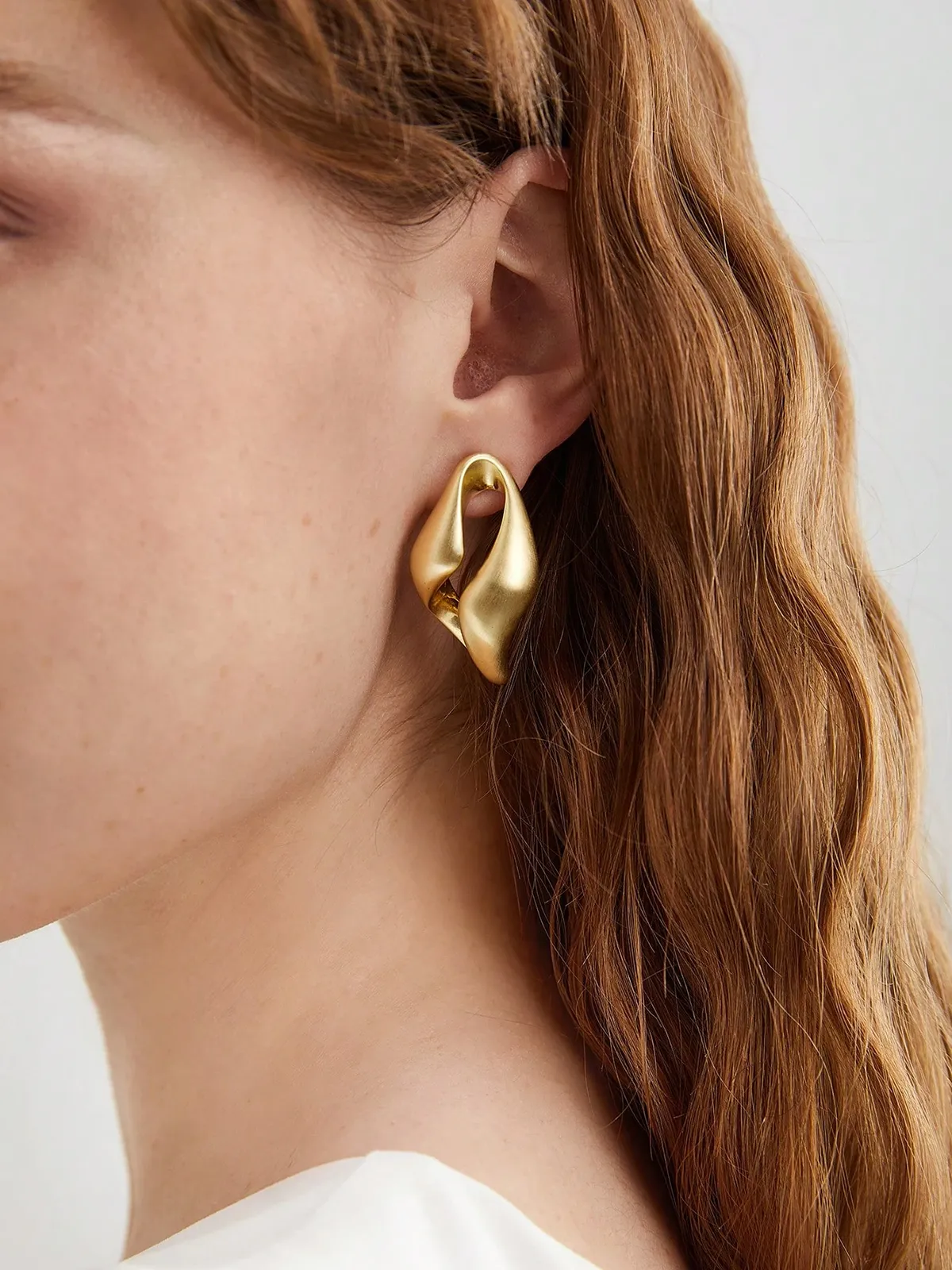 Twisted Sculptural Hoop Earrings sold by COMMENSE product image thumbnail 2