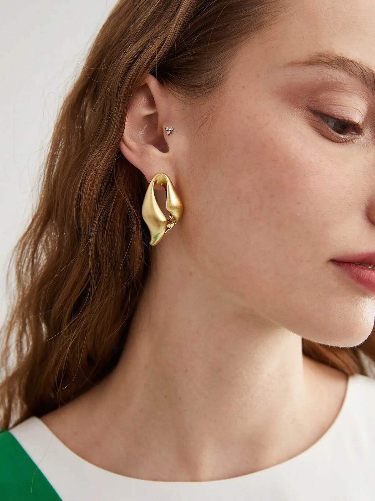 Twisted Sculptural Hoop Earrings sold by COMMENSE product image thumbnail 3