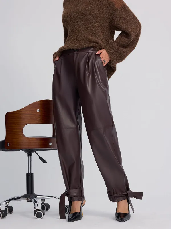 Cuff-Tie Faux Leather Tapered Pants sold by COMMENSE