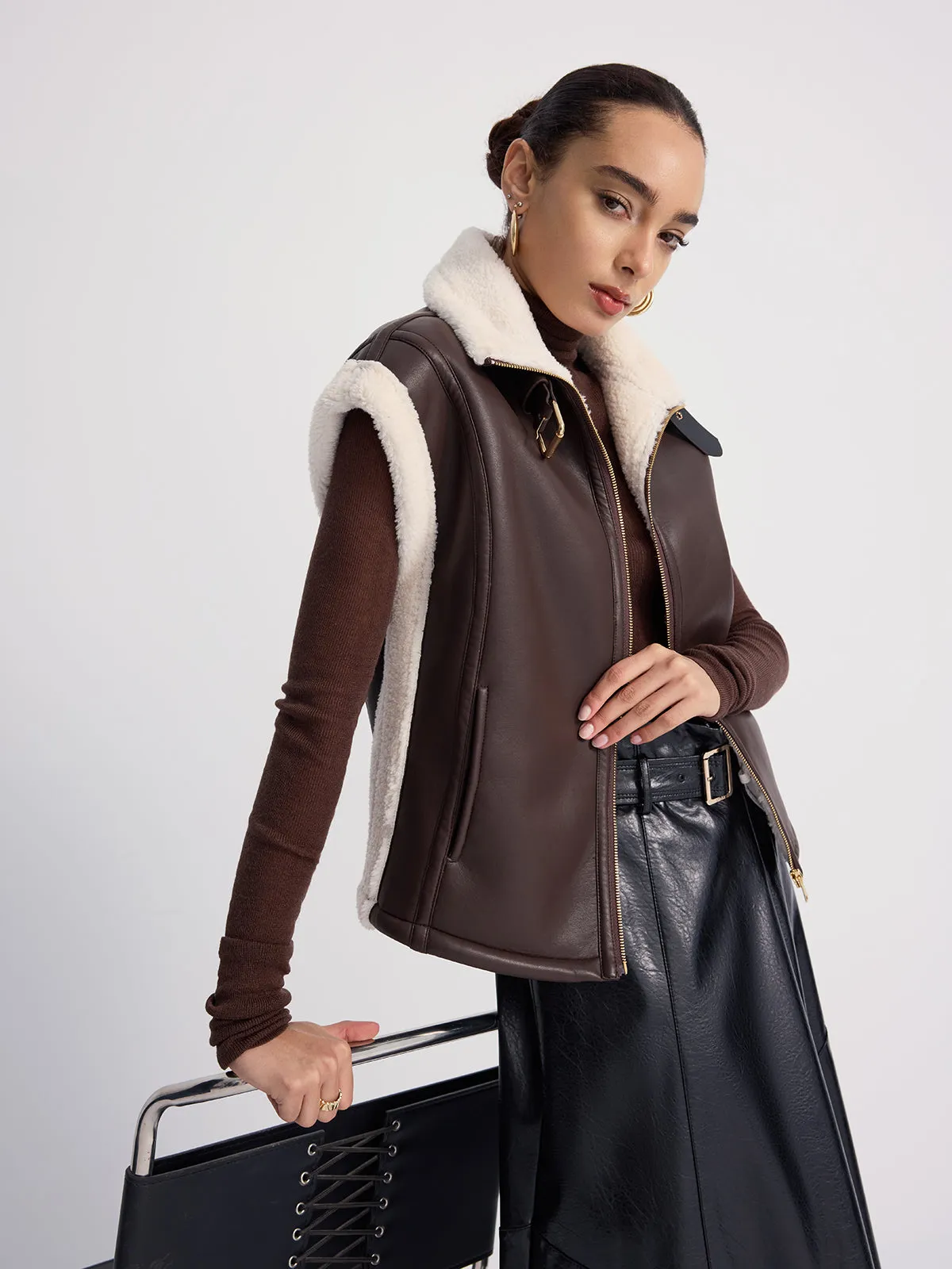 Shearling-Trimmed Faux Leather Sleeveless Vest sold by COMMENSE