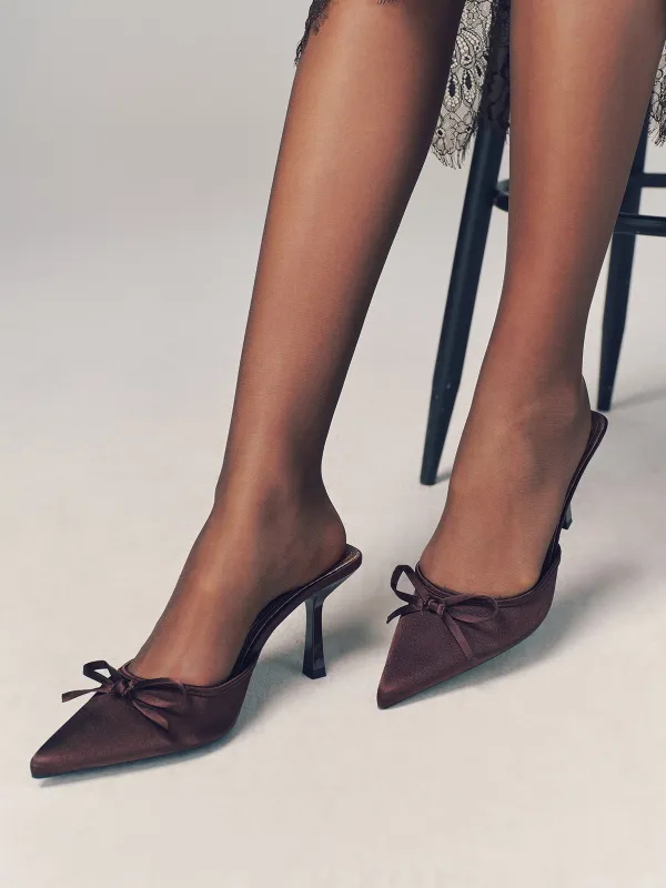 Pointed-Toe Bow-Accent Stiletto Mules sold by COMMENSE