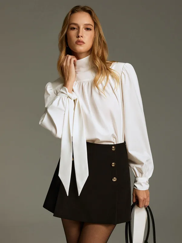 Tie-Cuff Turtleneck Blouse sold by COMMENSE