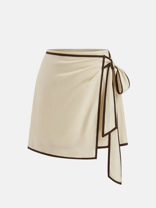 Contrast Piping Linen-Blend Wrap Mini Skirt sold by COMMENSE