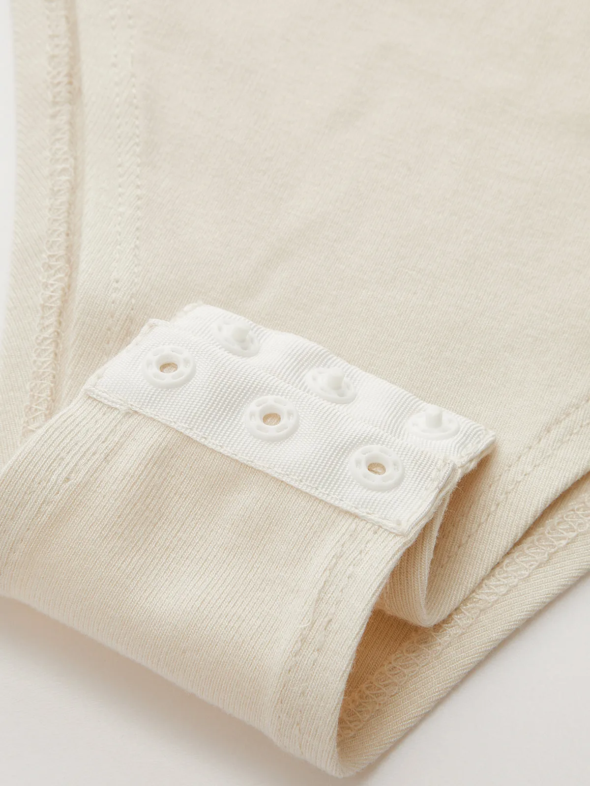 Metal Detail Mock Neck Ruched Bodysuit sold by COMMENSE product image thumbnail 4