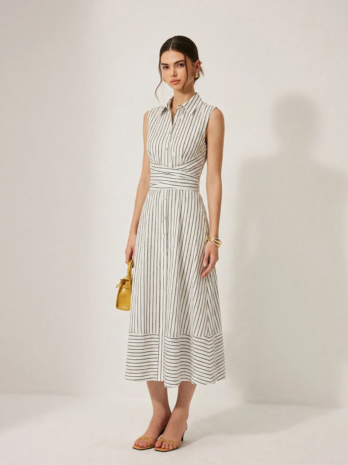Striped Collared Sleeveless Tie Waist Midi Dress sold by COMMENSE