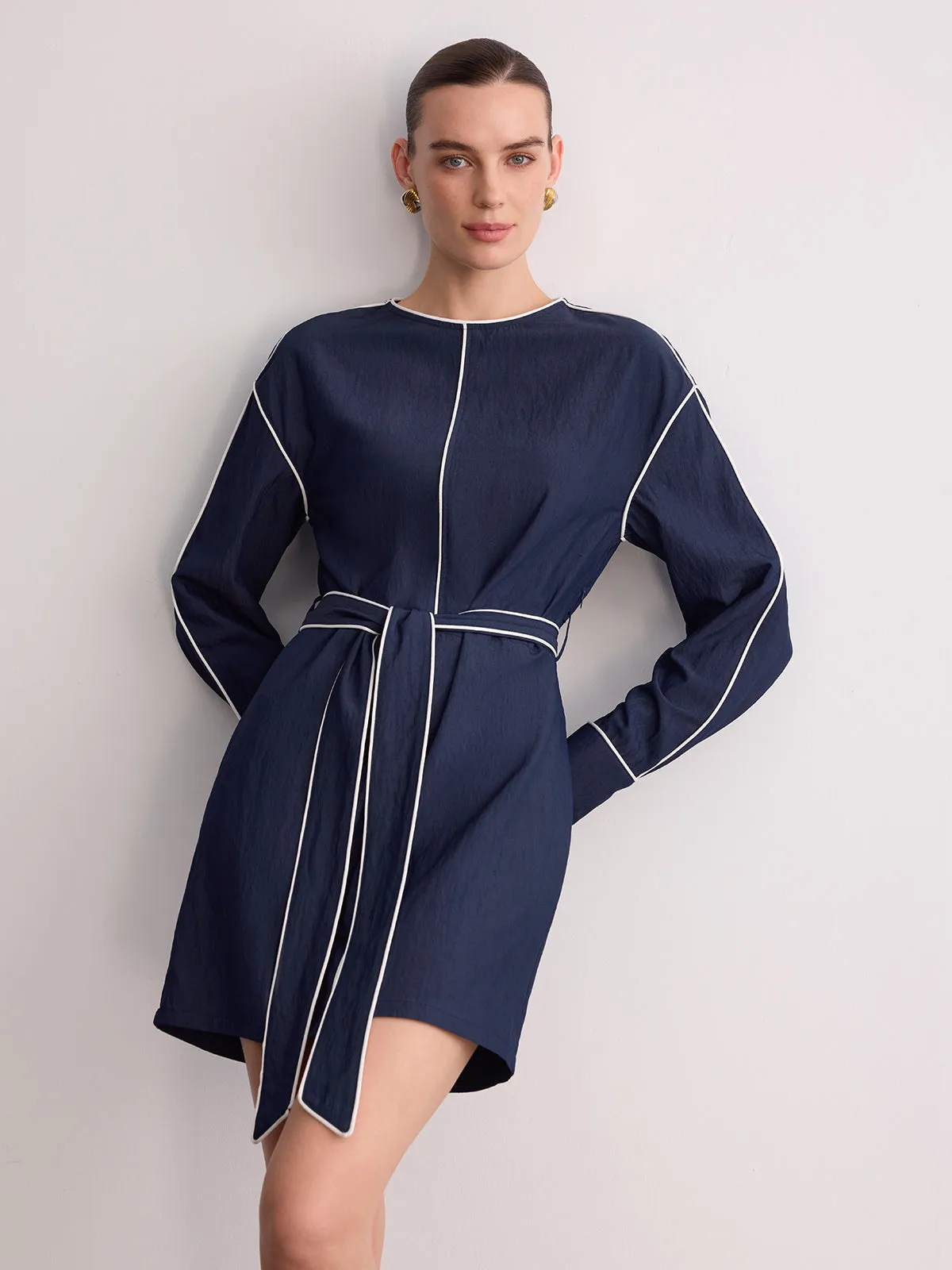 Belted Contrast Piping Long Sleeve Mini Dress sold by COMMENSE