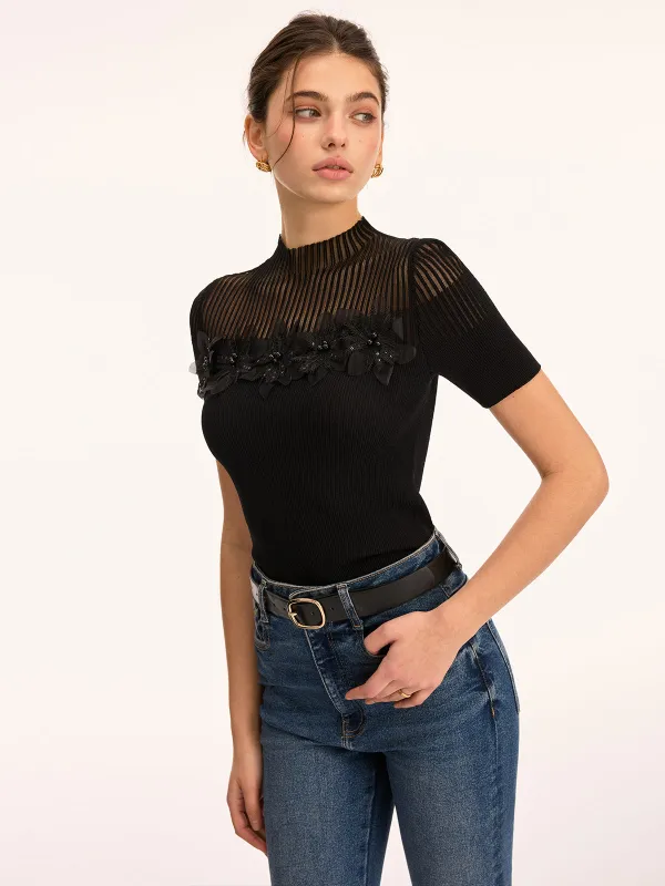 3D Floral Applique Sheer Mock Neck Knit Top sold by COMMENSE