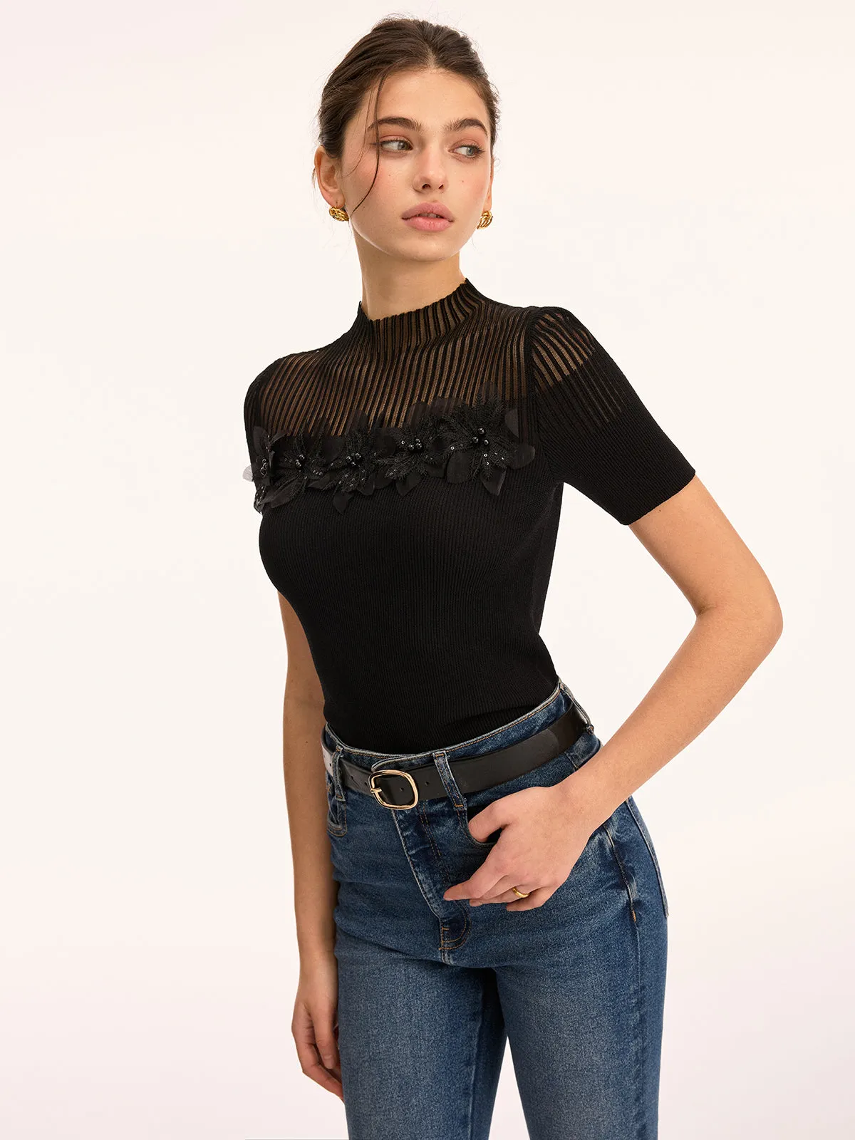 3D Floral Applique Sheer Mock Neck Knit Top sold by COMMENSE