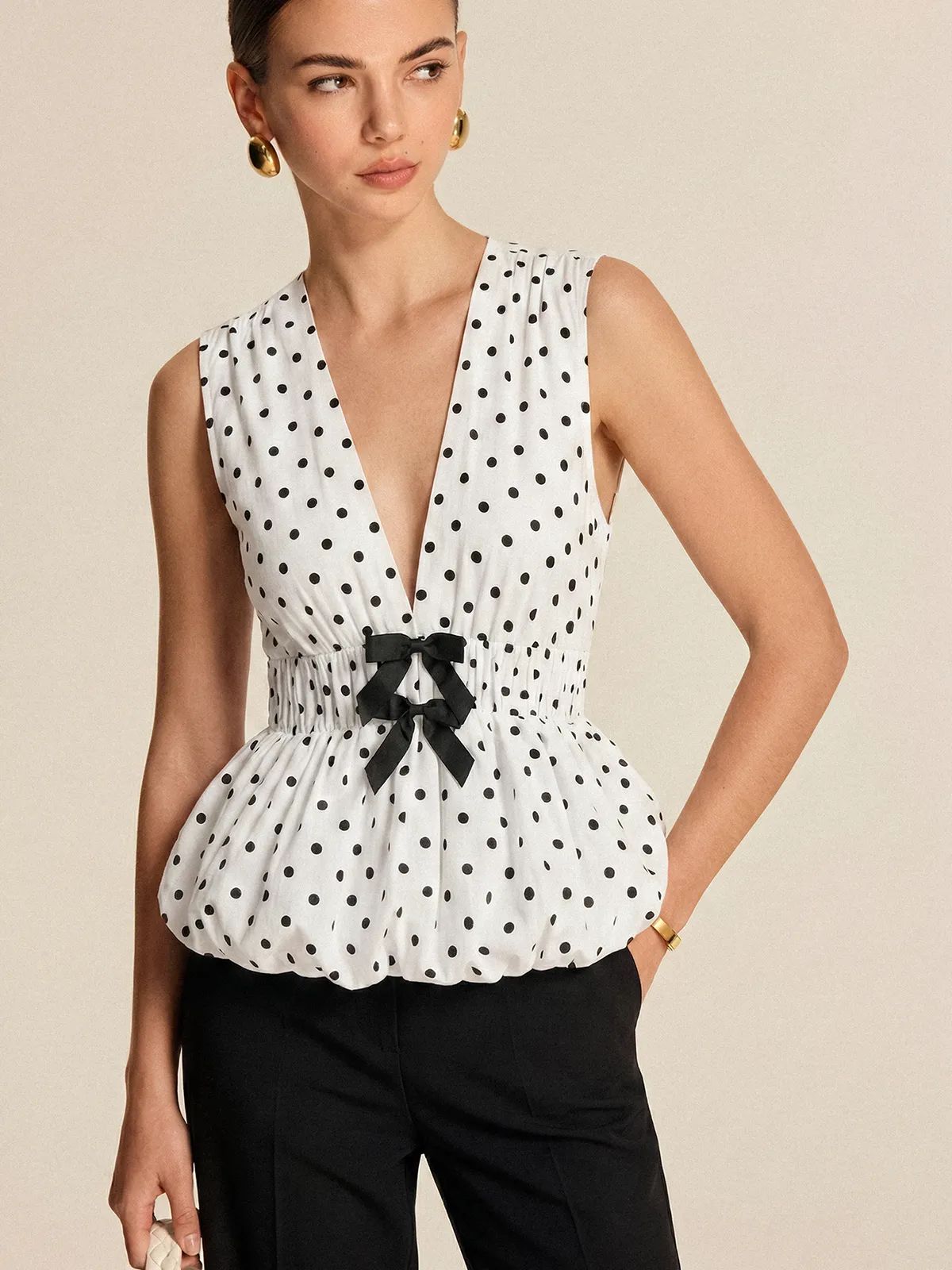 Polka Dot Bow Sleeveless Peplum Top sold by COMMENSE