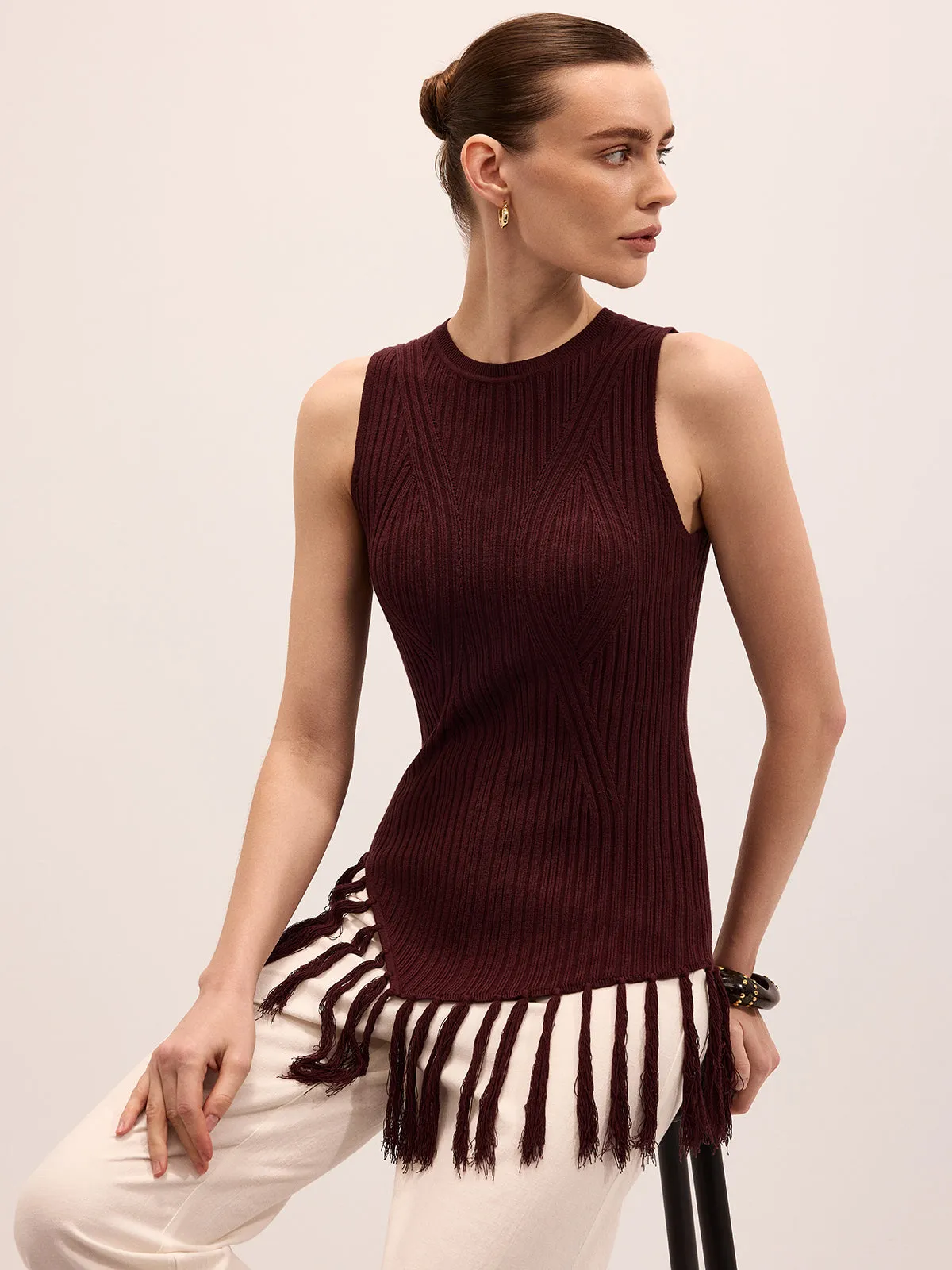 Sleeveless Fringe Hem Ribbed Knit Top sold by COMMENSE
