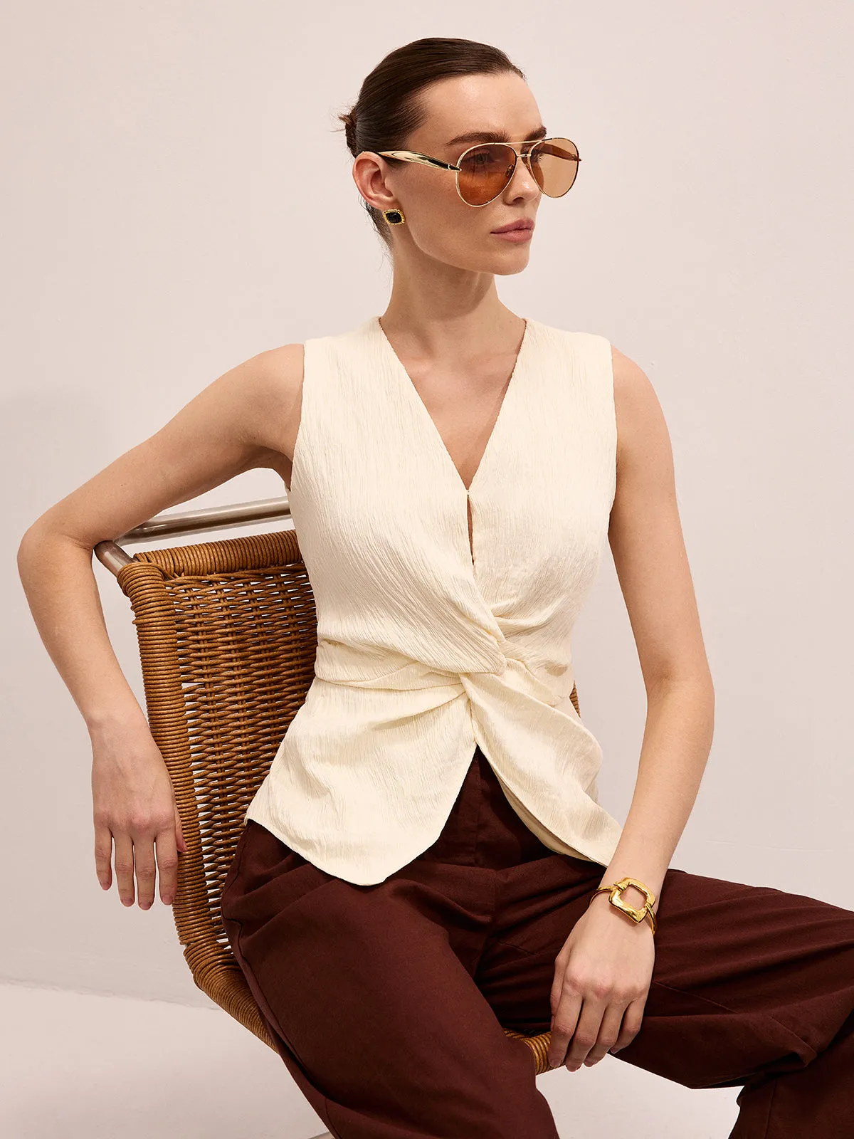 Twisted Sleeveless V-Neck Blouse sold by COMMENSE