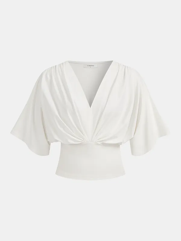 V-Neck Twist Front Batwing Sleeve Fitted Top made by COMMENSE