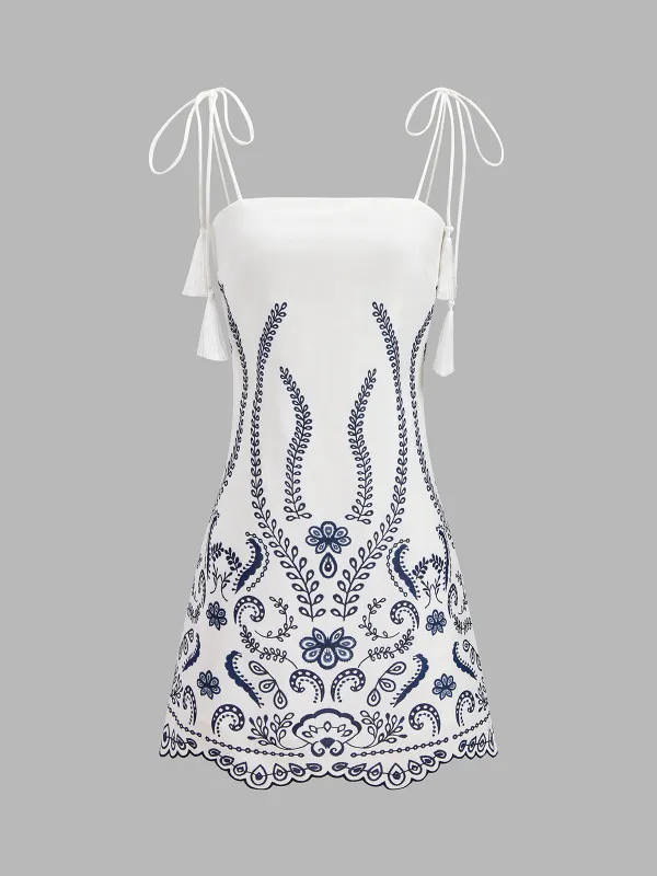 Tassel Tie Embroidered Cami Mini Dress made by COMMENSE