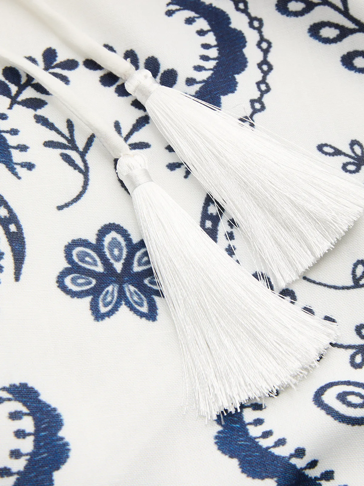 Tassel Tie Embroidered Cami Mini Dress sold by COMMENSE product image thumbnail 5