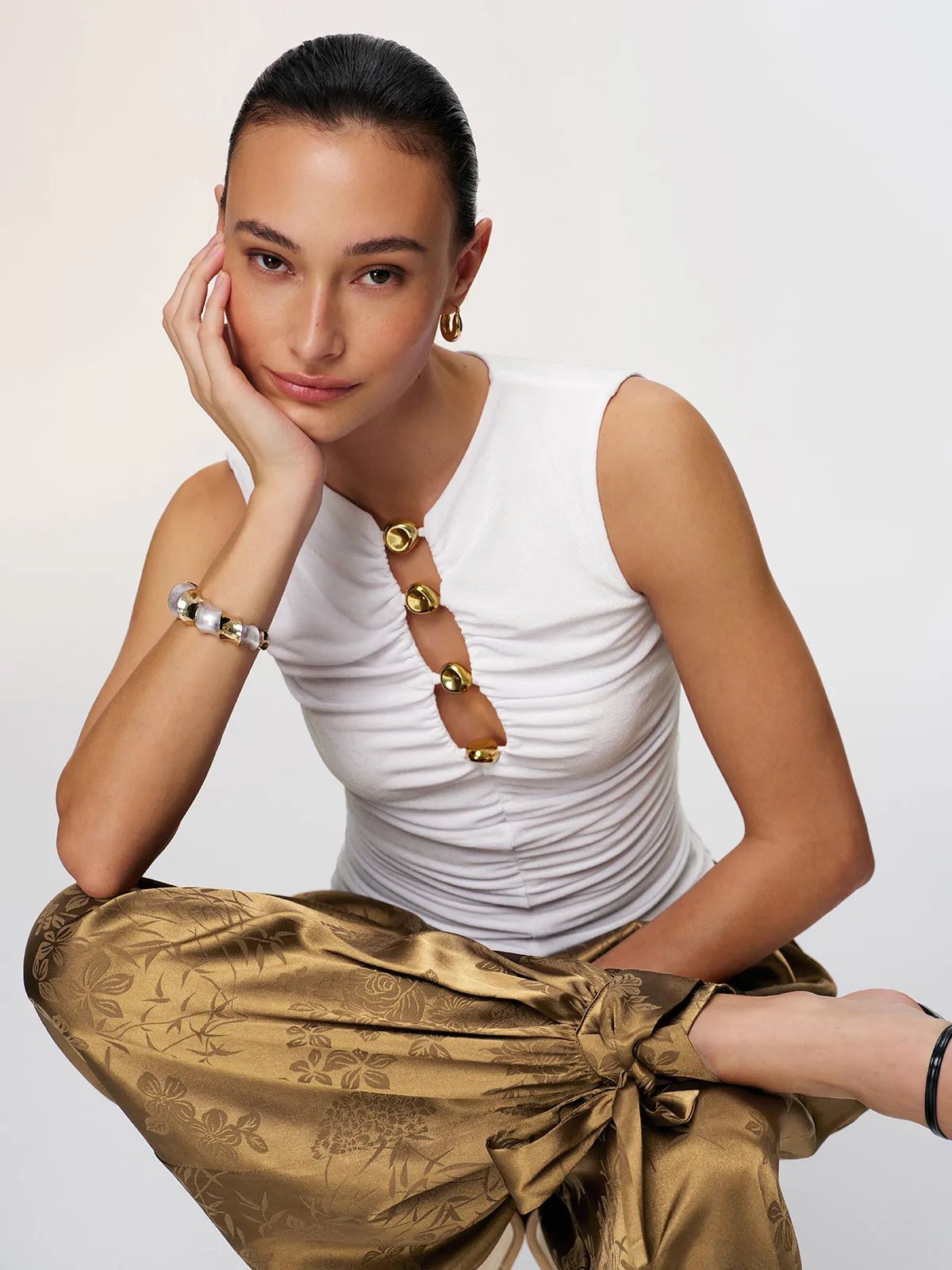 Metal Detail Cut-Out Sleeveless Ruched Top sold by COMMENSE