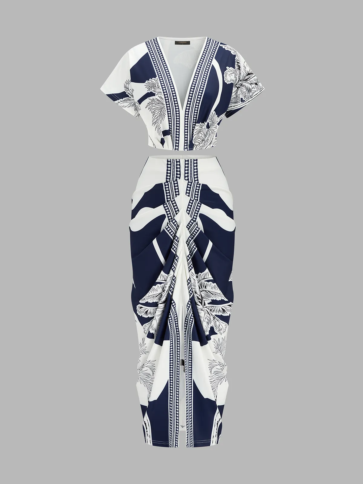 Printed V-Neck Top & Ruched Midi Skirt Set sold by COMMENSE