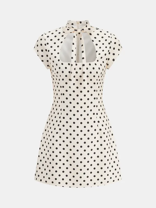 Polka Dot Cut-Out Tie-Neck Mini Dress made by COMMENSE