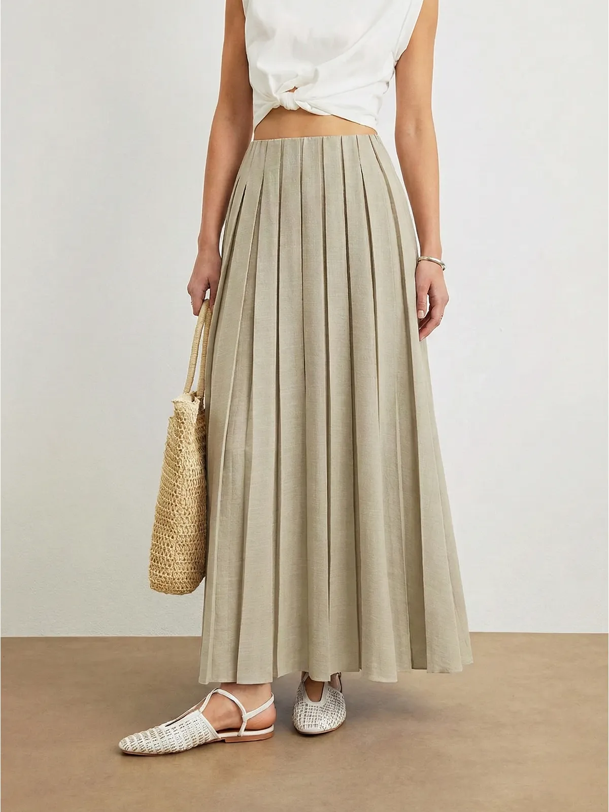 Elastic Waist Pleated Midi Skirt sold by COMMENSE