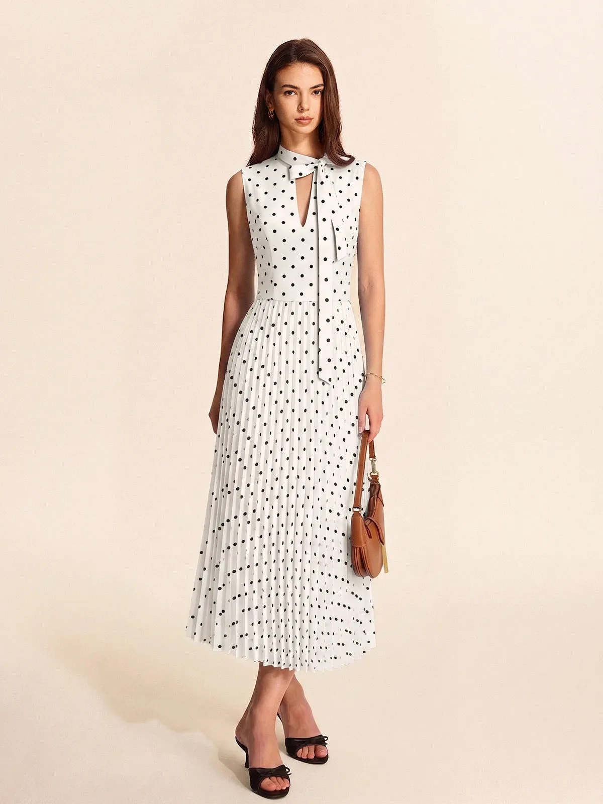 Polka Dot Sleeveless Pleated Dress with Neck Tie sold by COMMENSE