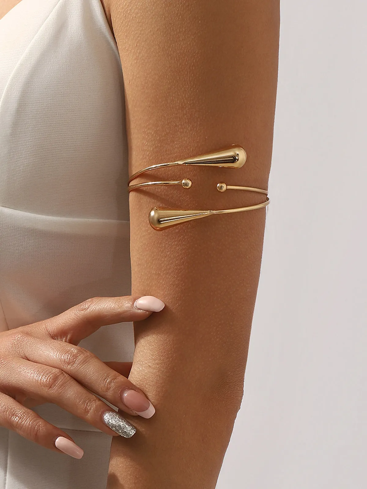 Minimalist Teardrop Open Upper Arm Cuff sold by COMMENSE