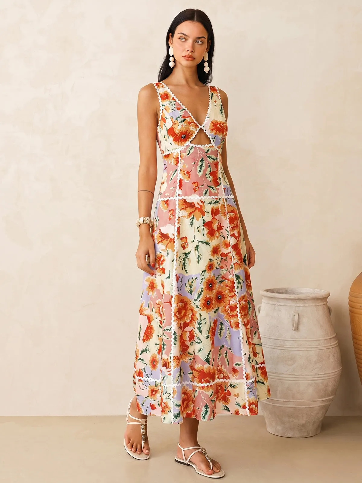 Sleeveless Floral Print Backless Maxi Dress sold by COMMENSE