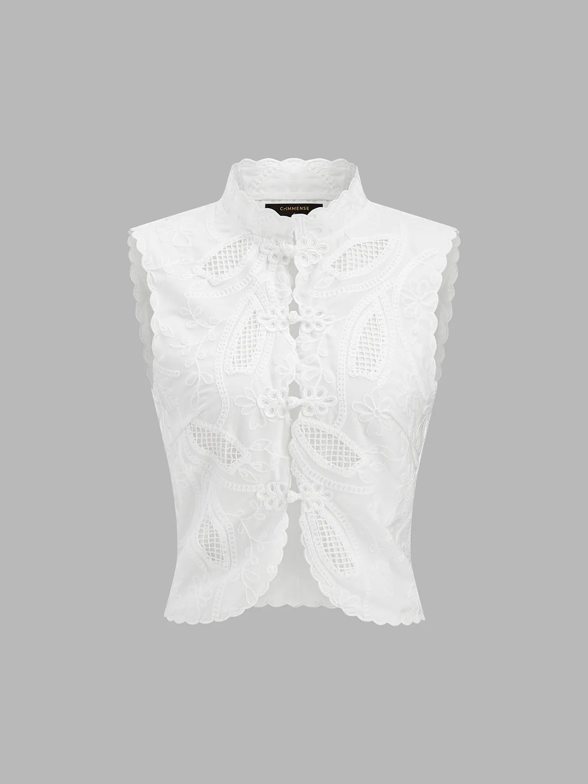 Frog Button Eyelet Embroidered Sleeveless Top sold by COMMENSE