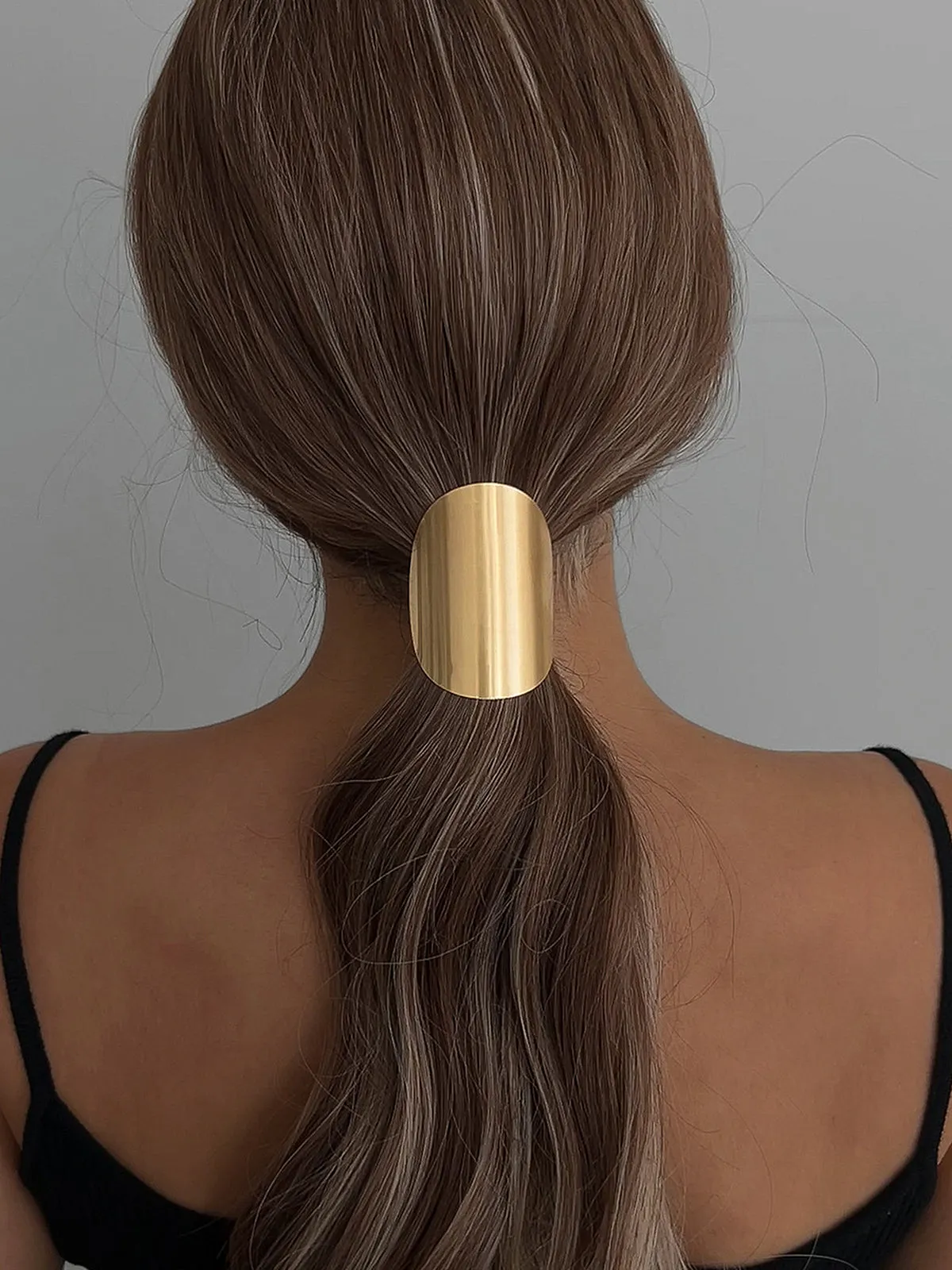 Minimalist Metallic Oval Ponytail Hair Clip sold by COMMENSE