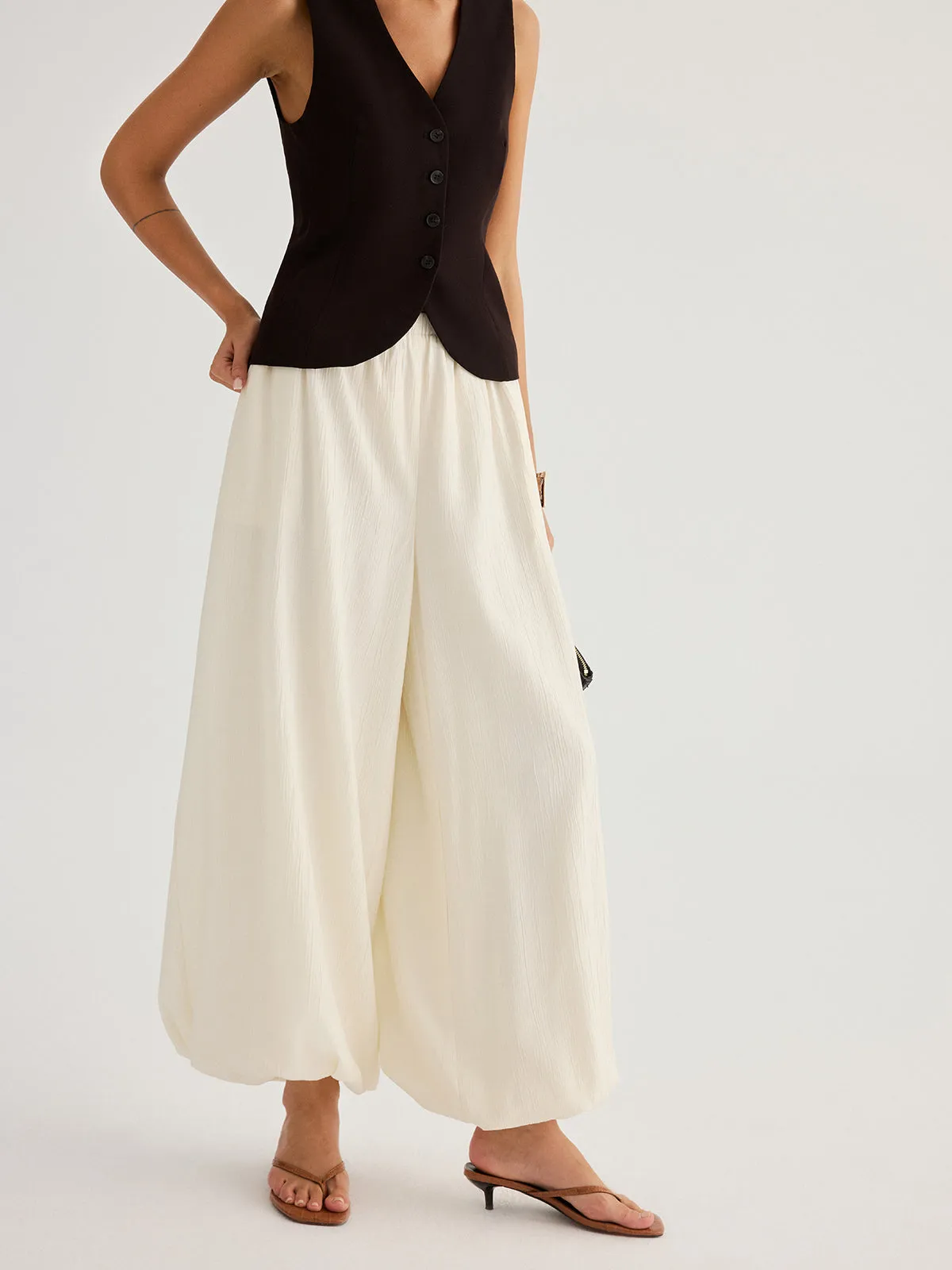 Elastic Waist Crinkled Balloon Pants sold by COMMENSE