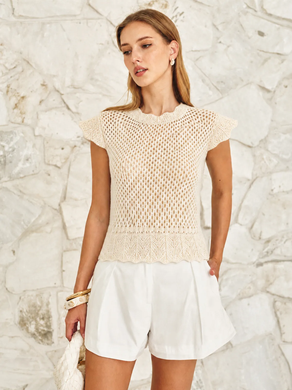 Hollow Crochet Cap Sleeve Knit Top sold by COMMENSE