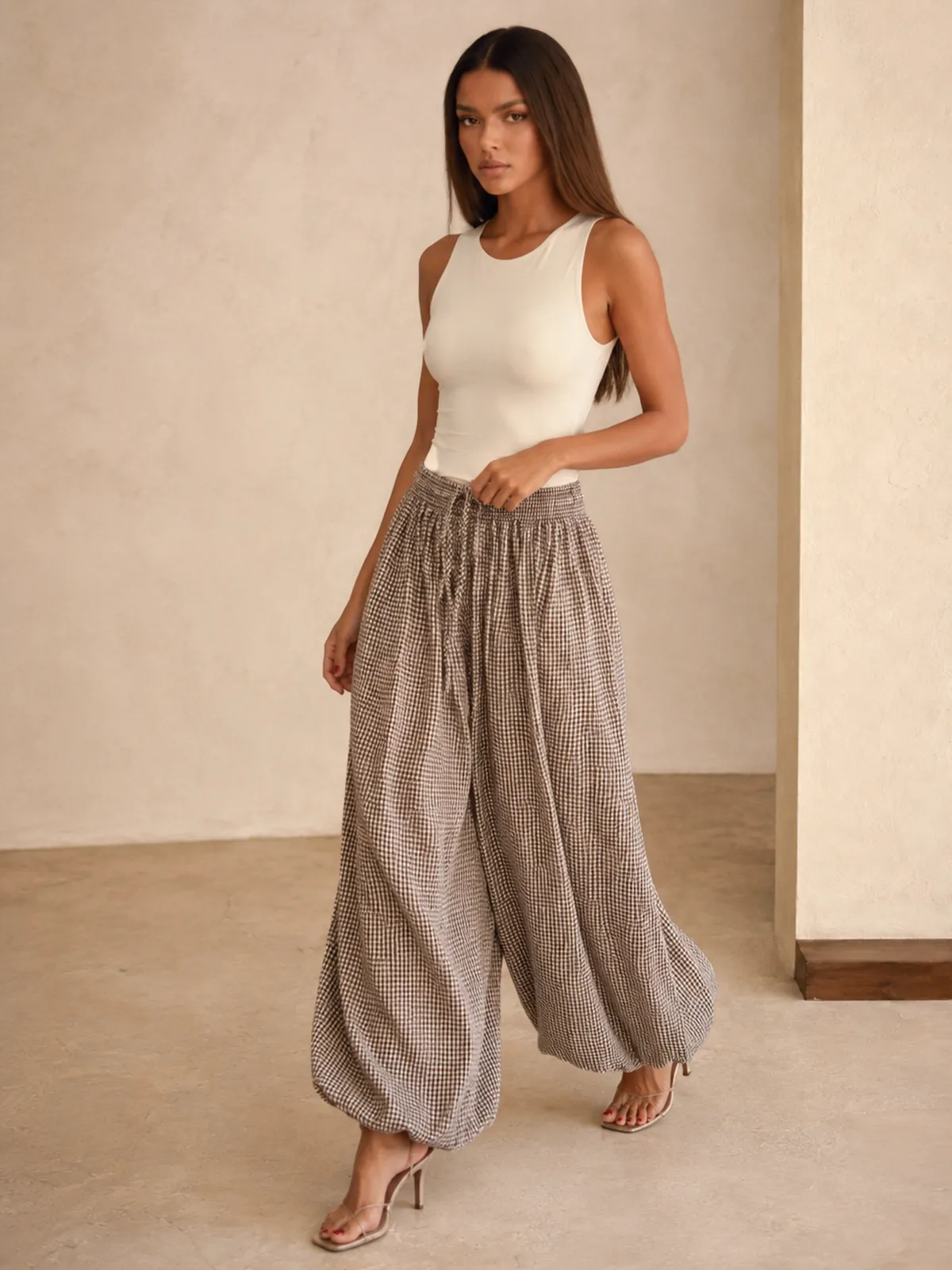 Drawstring Plaid Loose Balloon Pants sold by COMMENSE