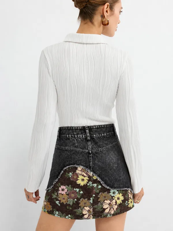 Floral Patch Fringe Denim Mini Skirt made by COMMENSE