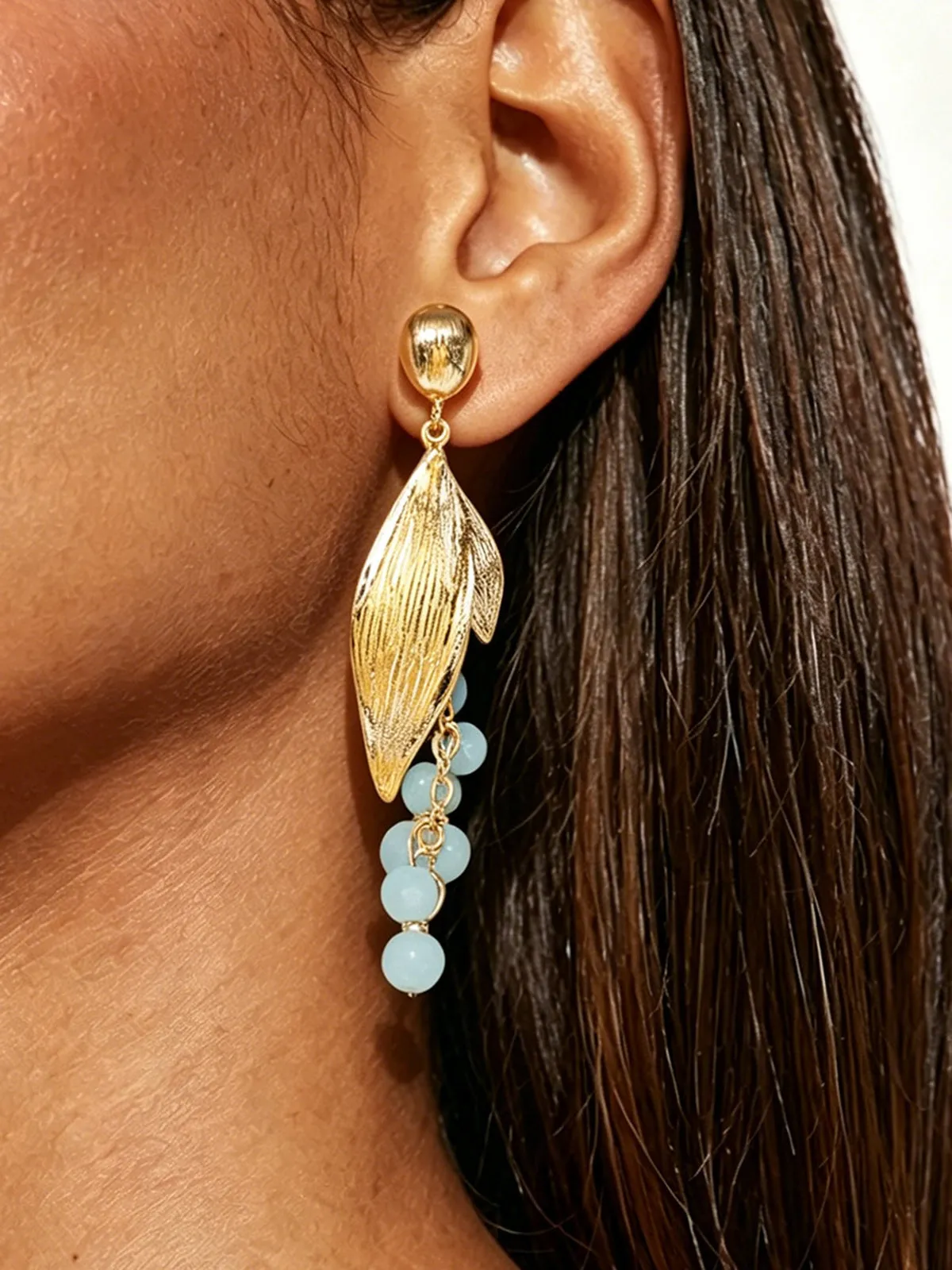 Metallic Leaf Bead Dangle Earrings sold by COMMENSE