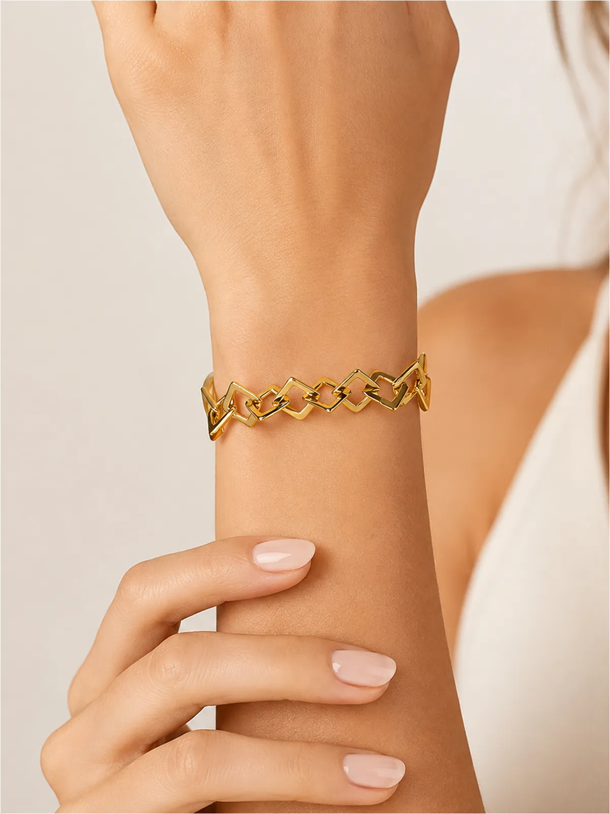 Interlocking Square Link Bracelet sold by COMMENSE