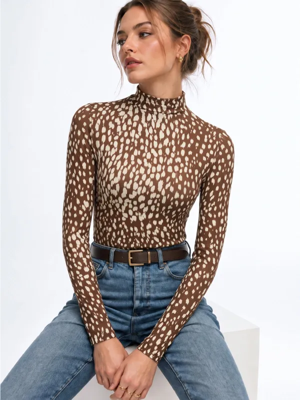 Animal Spot Print Mock Neck Top made by COMMENSE
