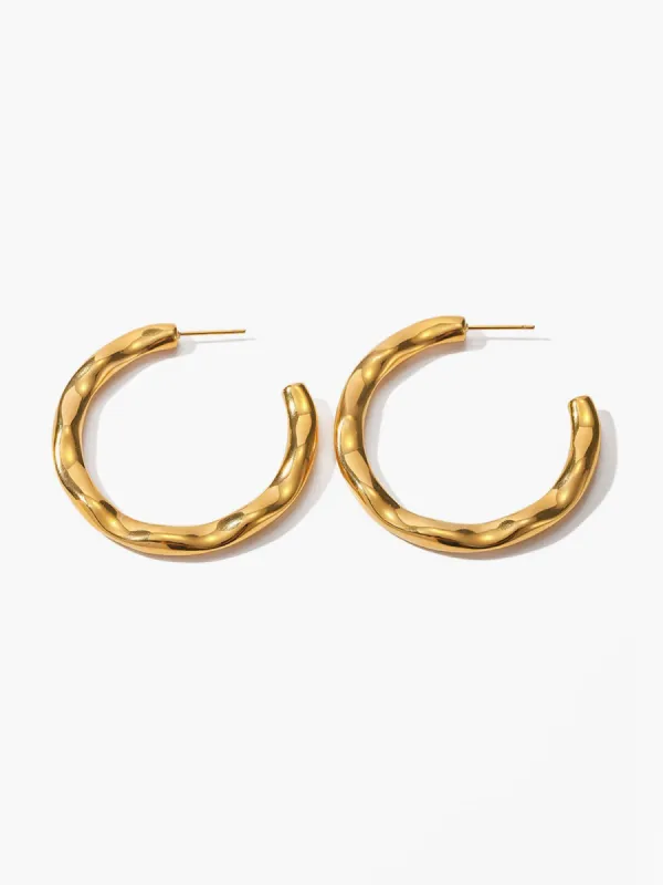 Twist Hoop Earrings sold by COMMENSE