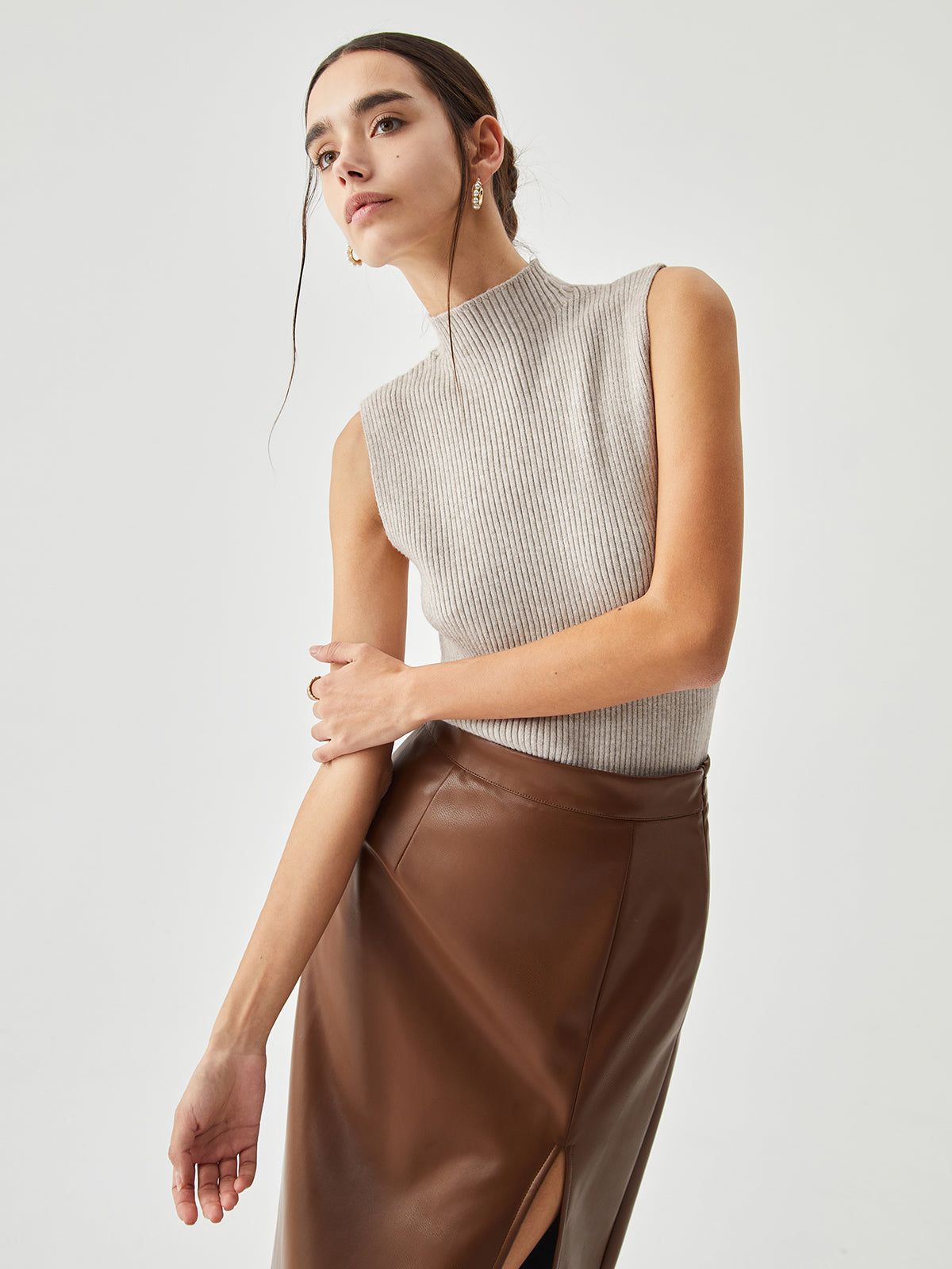 Elegant Mock Neck Ribbed Knit Sleeveless Sweater sold by COMMENSE