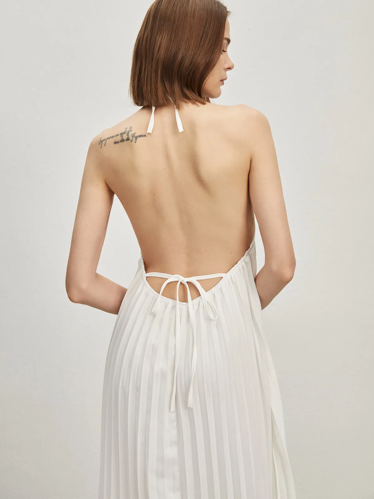 Tie-Back Open Back Pleated Long Dress sold by COMMENSE
