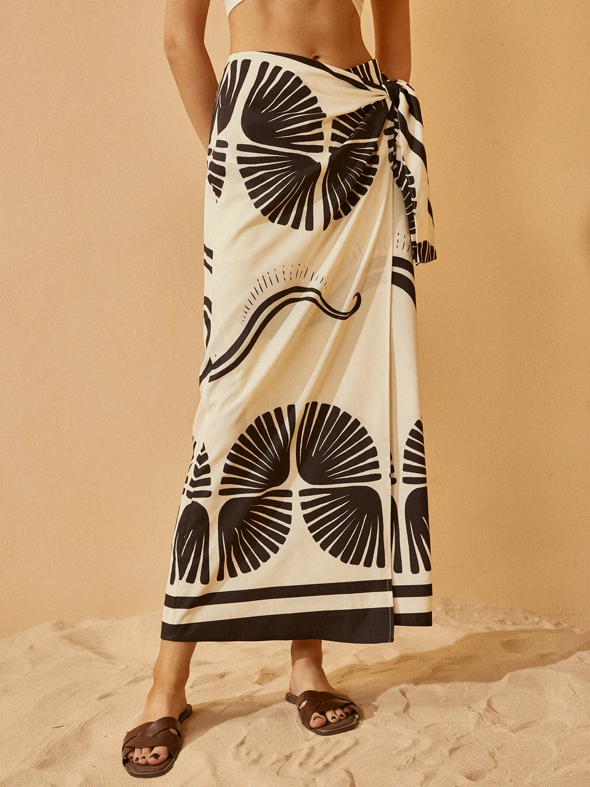 Knotted Wrap Floral Skirt sold by COMMENSE