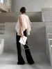 Oversized High-Low Hem Sleeveless Top sold by COMMENSE