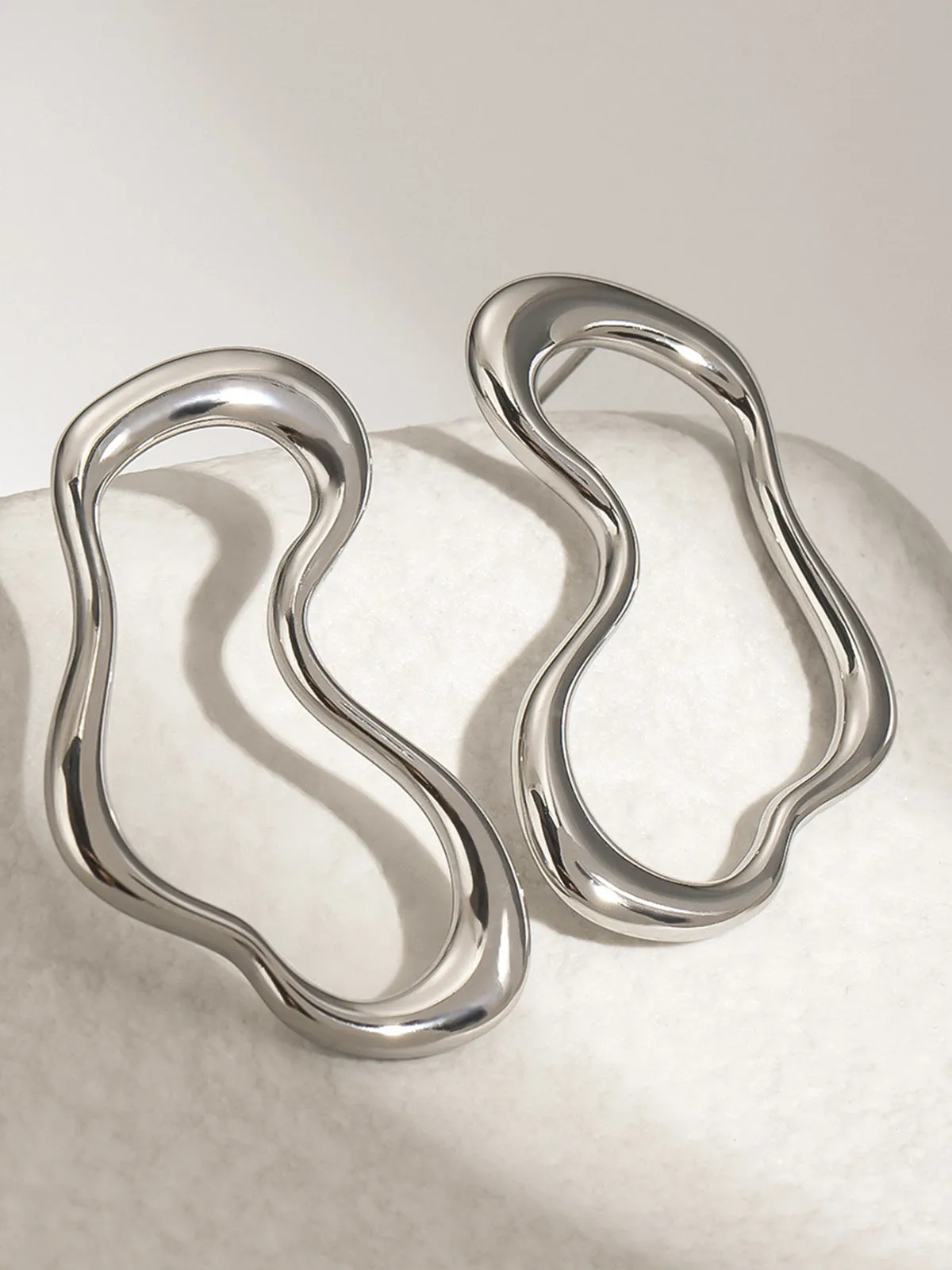 Irregular Metal Stud Earrings sold by COMMENSE