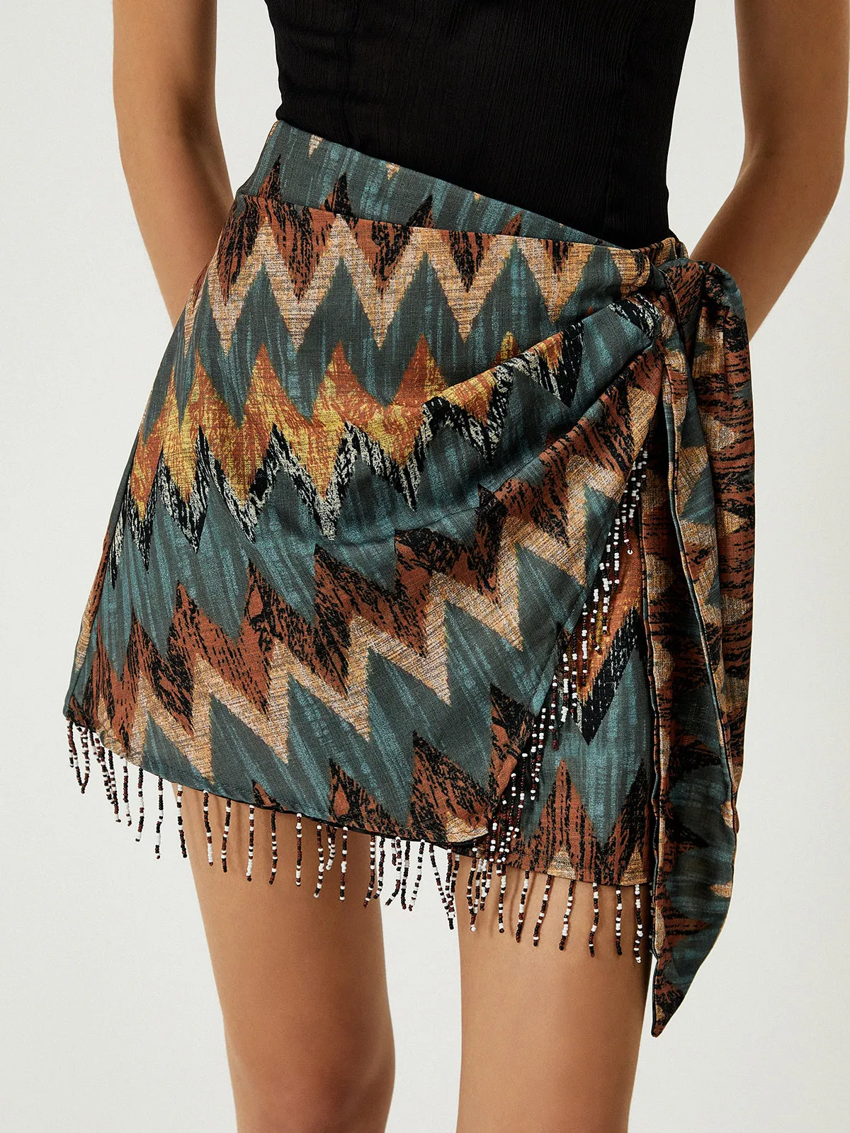 Print Tassel Hem Knotted Mini Skirt sold by COMMENSE