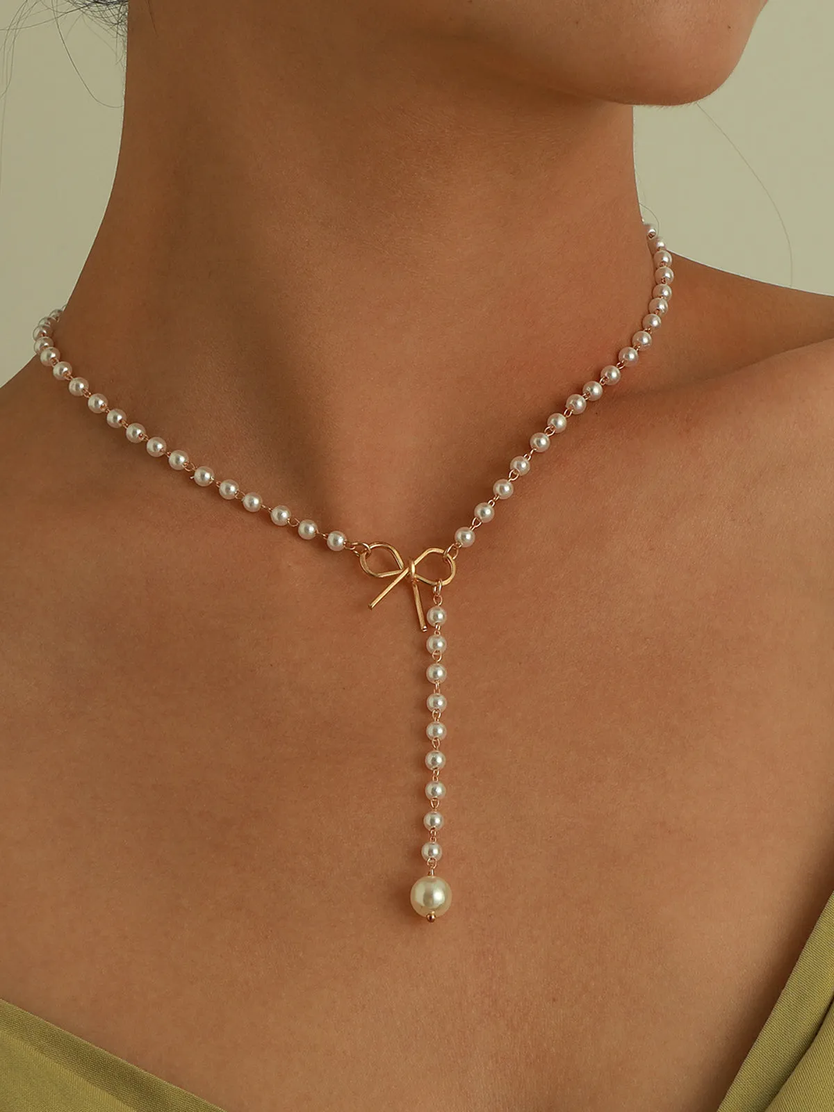 Pearl Bow Knot Pendant Necklace sold by COMMENSE product image thumbnail 2