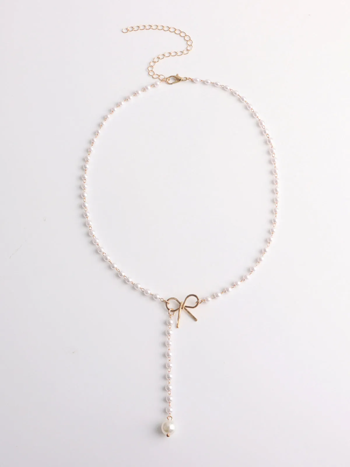 Pearl Bow Knot Pendant Necklace sold by COMMENSE product image thumbnail 3