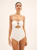 Pearl Cutout Knotted One Piece Swimsuit sold by COMMENSE
