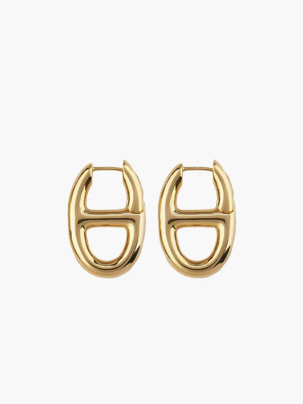 Golden Pig Nose Earrings sold by COMMENSE