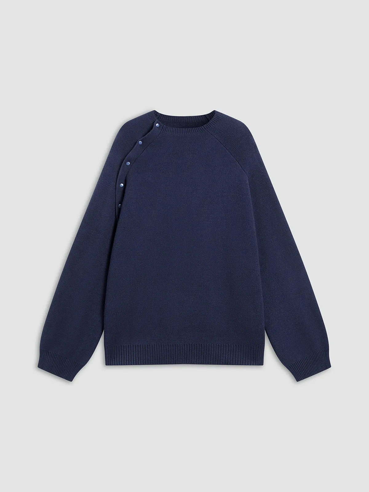 Side Buttons Decor Sweater sold by COMMENSE