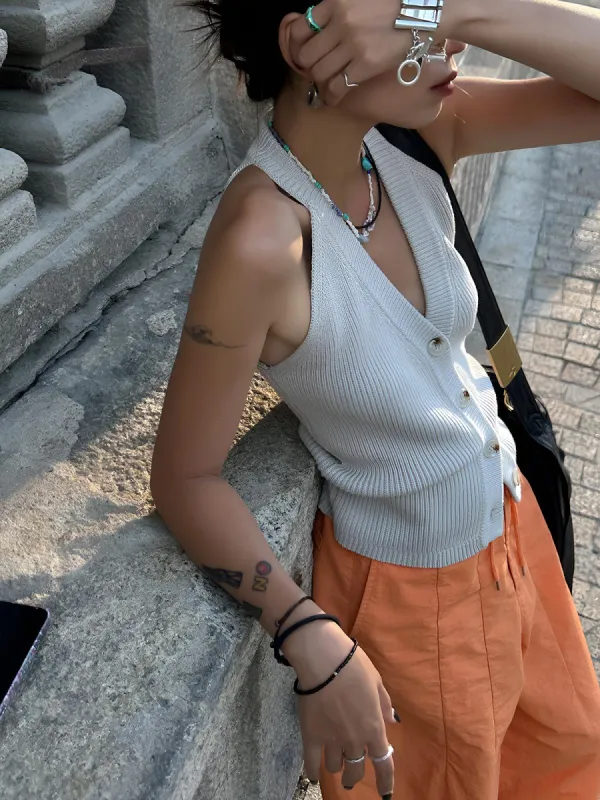 Button V-Neck Knit Vest sold by COMMENSE