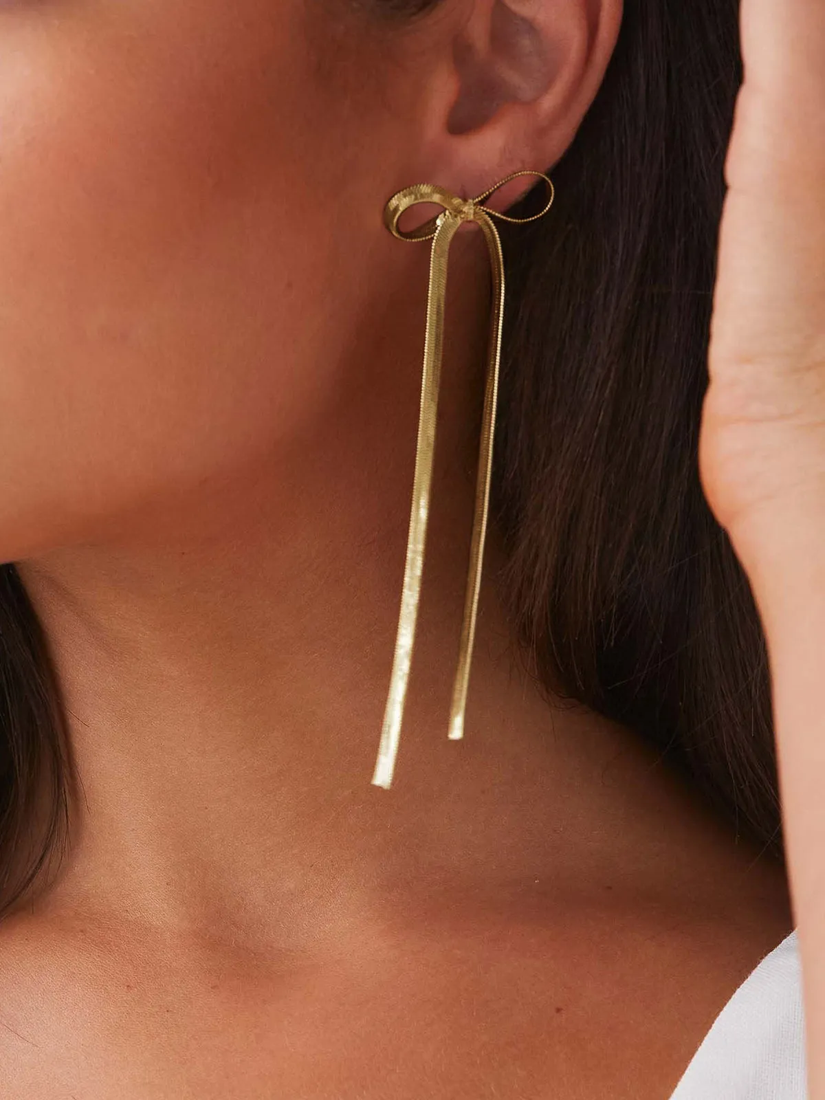 Metal Ribbon Bow Earrings sold by COMMENSE product image thumbnail 3